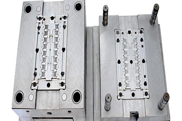Multi-cavity injection mould halves on the bench